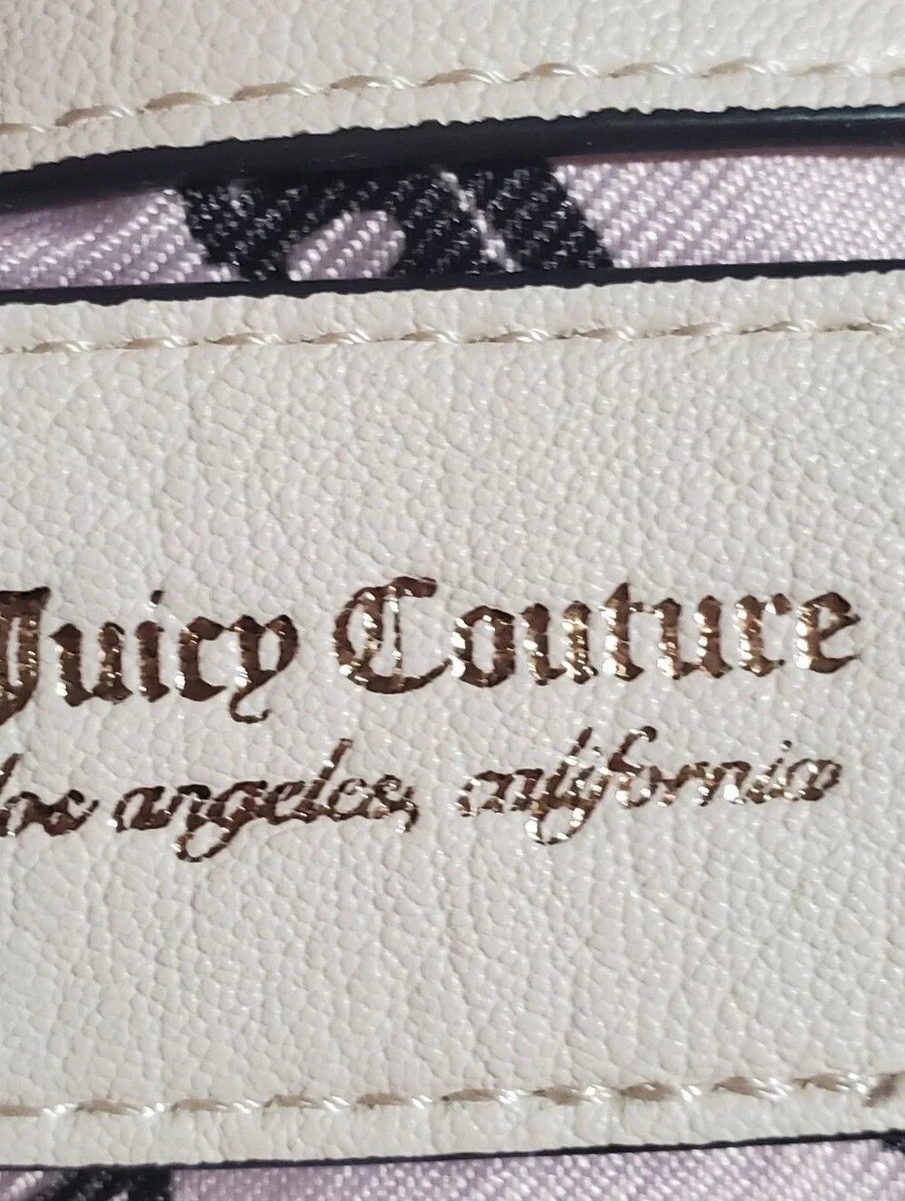 JUICY COUTURE ROYAL CREST HOBO BAG. SOFT WHITE. GOLD TONE CHAIN.